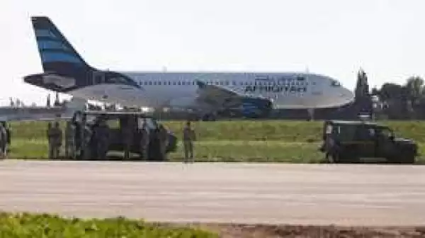 Photos: Libyan plane with118 people on board hijacked & diverted to Malta